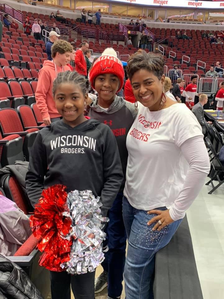 Jaidyn, Jerell and Jennifer at a Badgers basketball game